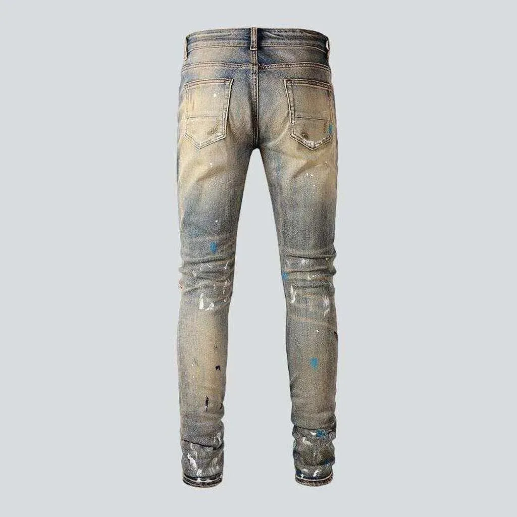 Vintage jeans with paint splatters